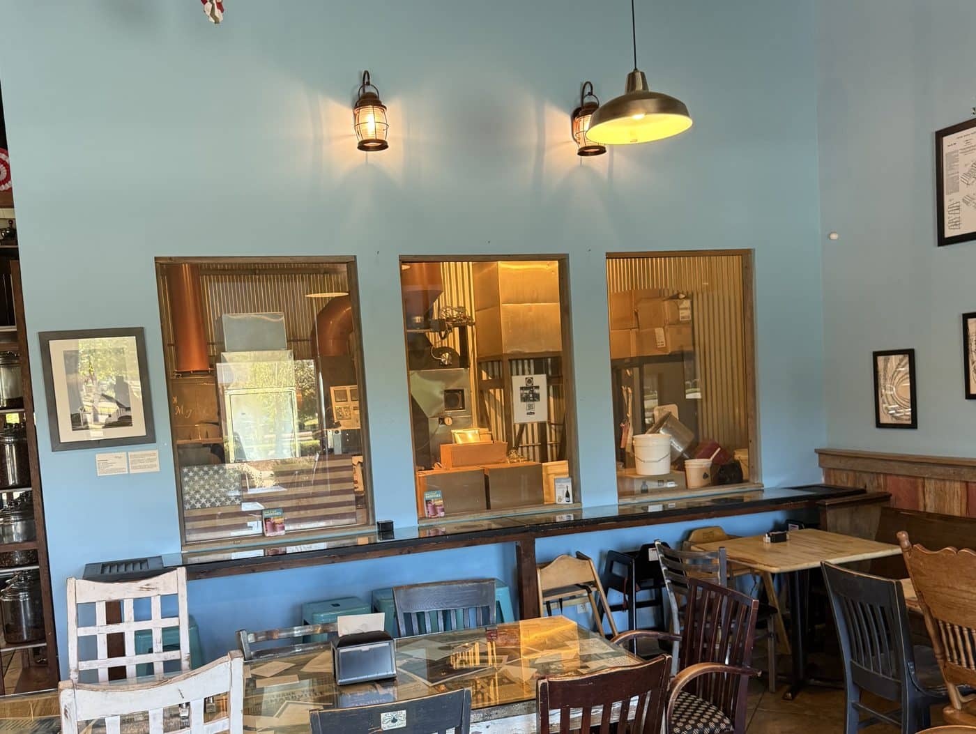 The glassed-in roasting room seen from the Mama’s Java dining room in Nolensville